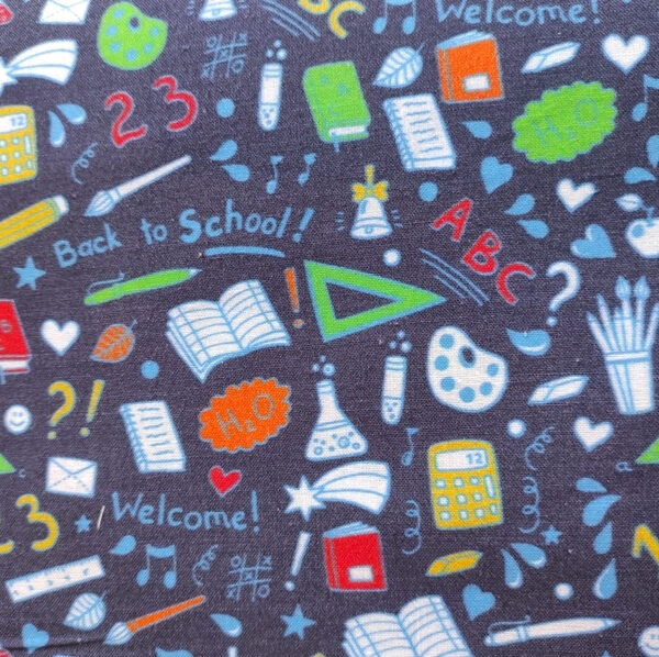 TELA AZUL MARINO CON MOTIVOS ESCOLARES 0140
