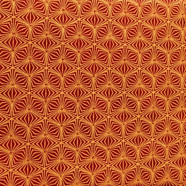 TELA ROJA CON ESTRELLAS DORADAS 0160