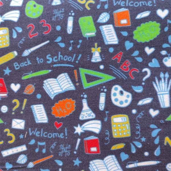TELA AZUL MARINO CON MOTIVOS ESCOLARES 0140
